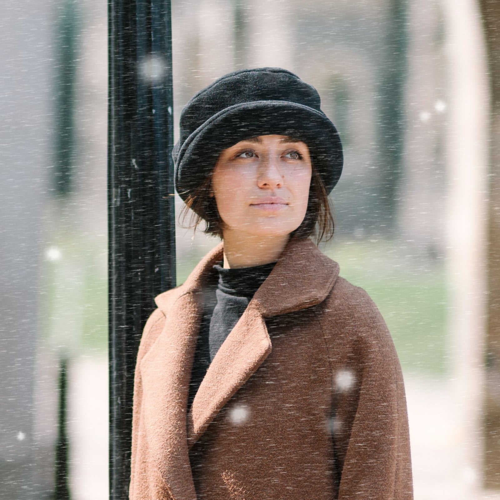 Polartec Classic 200 Fleece Rolled Brim hat-Warm pulls down over ears, doesn't mess our hair.  Pair with a dress coat or casual jacket, made in canada by puffin gear
