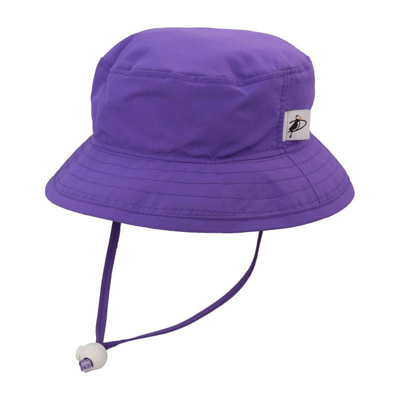purple solar nylon kids camp hat with UPF50 sun protection rating, chin tie has toggle and safety breakaway clip, made in canada by puffin gear, quick dry perfect for a day at beach