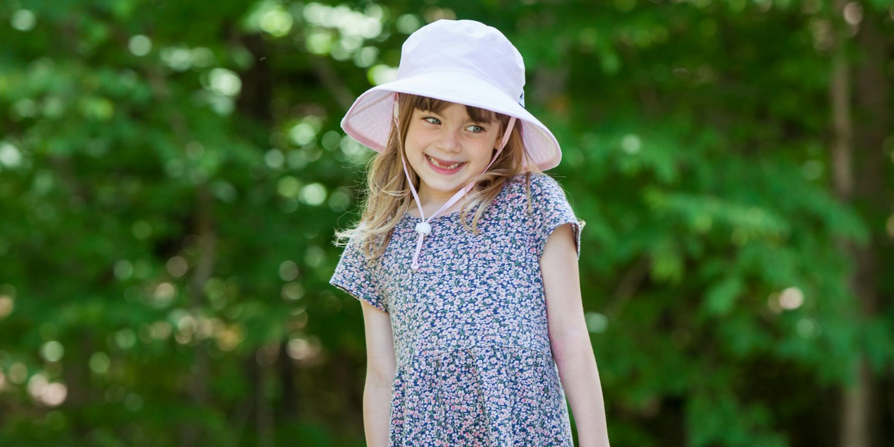 Kids UPF50 Wide Brim Sunbaby Hat with UPF50 Excellent Sun Protection Rating.  This means it blocks at least 97.5% UVA and UVB radiation.  Prewashed, Machine Washable. Made in Canada by Puffin Gear