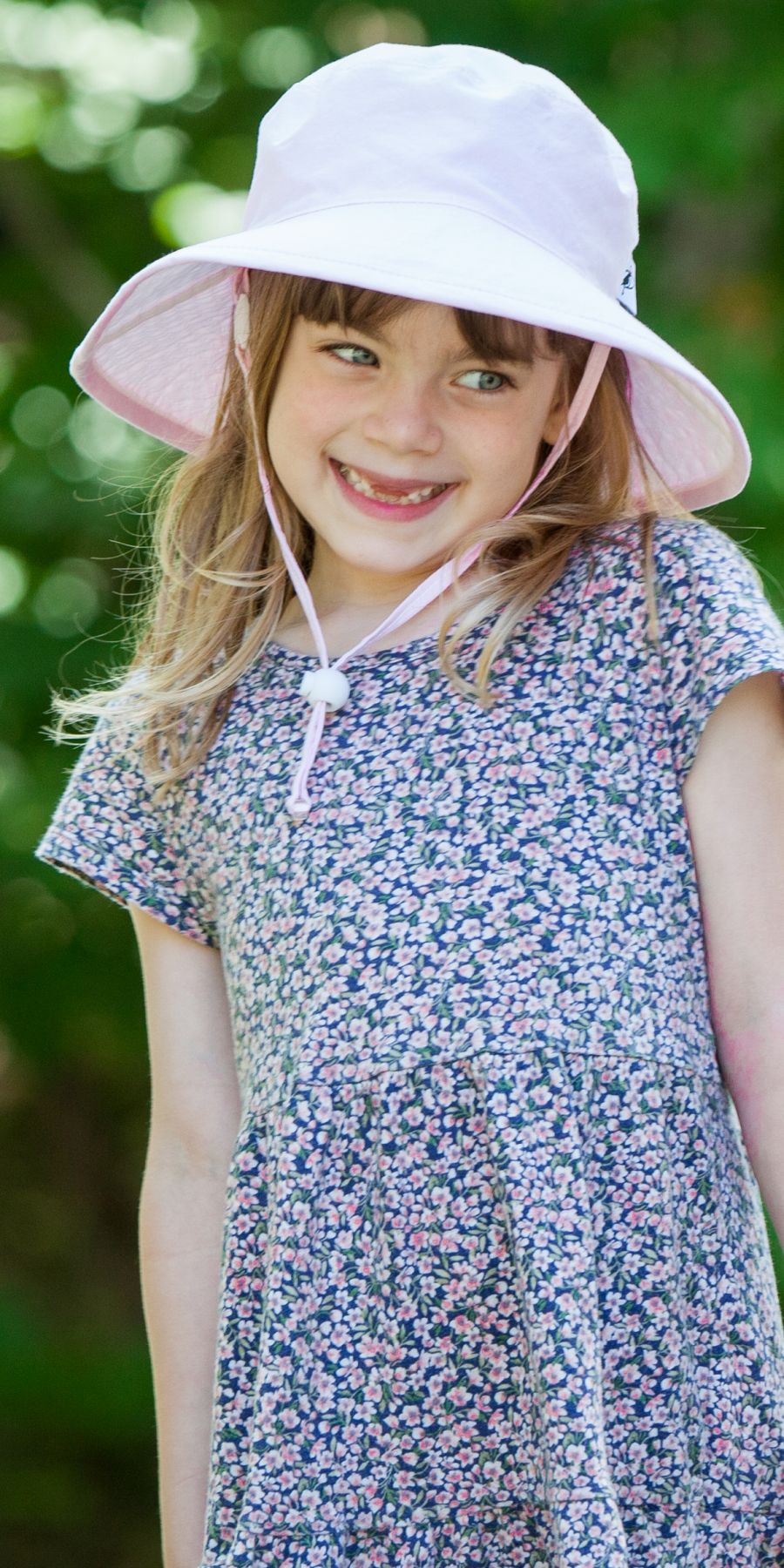Kids UPF50 Wide Brim Sunbaby Hat with UPF50 Excellent Sun Protection Rating.  This means it blocks at least 97.5% UVA and UVB radiation.  Prewashed, Machine Washable. Made in Canada by Puffin Gear