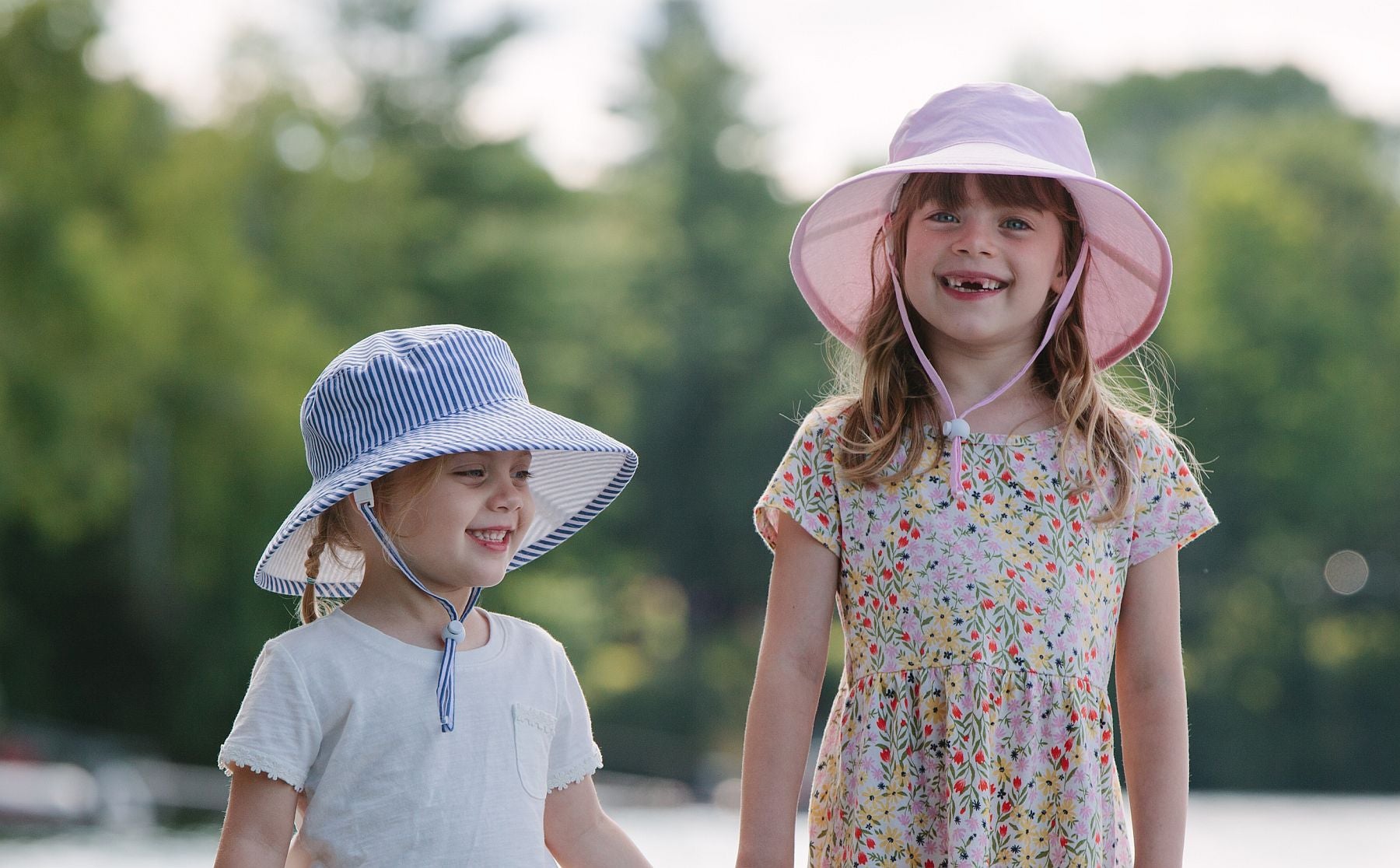 Kids Summer Hats Tested and Rated UPF50+ Sun Protection-Wide brim sunbaby hat, active wear camp hat-linen hats-cotton print hats-organic cotton hats-solar nylon hats-machine washable-chin ties keep hat safely on head-Made in Canada by Puffin Gear