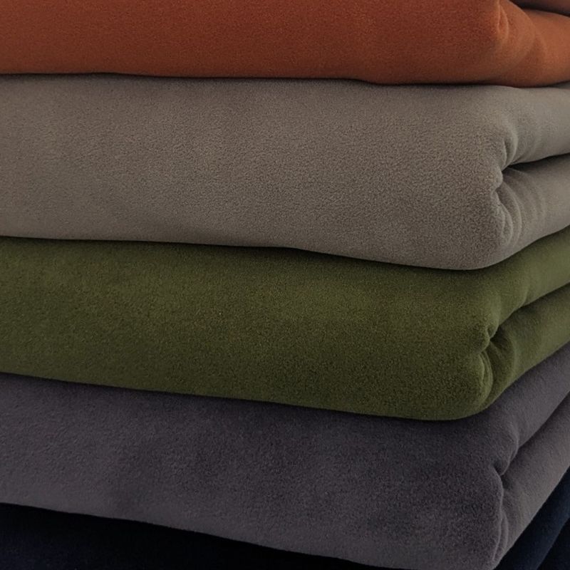 Stack of Polartec 300 Fleece Blankets-Warm, lightweight durable for home and cottage. Made in Canada