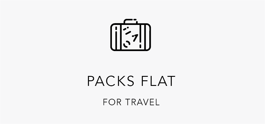 Icon of a suitcase with text 'Packs Flat for Travel' on a white background