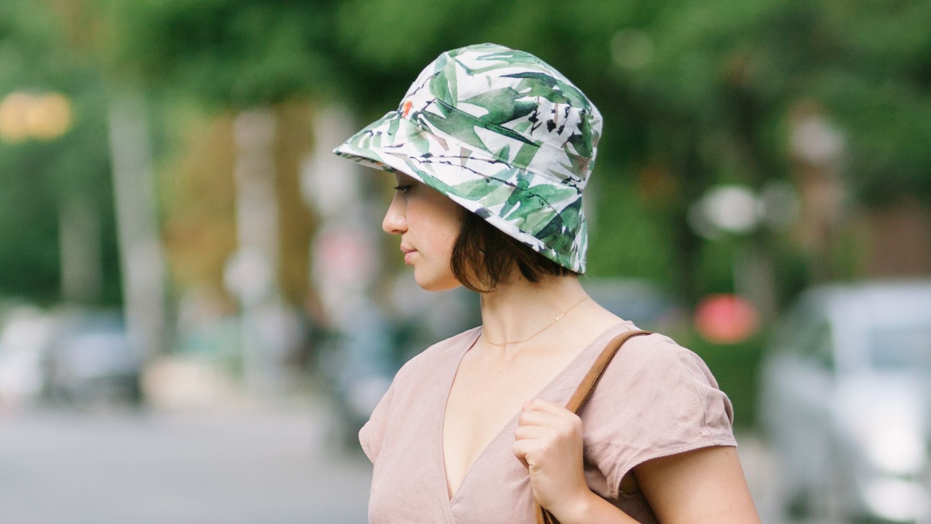 Three inch wide brim sun hat for active wear provides coverage of face and neck while allowing a range of vision. Made in Canada by Puffin Gear. 